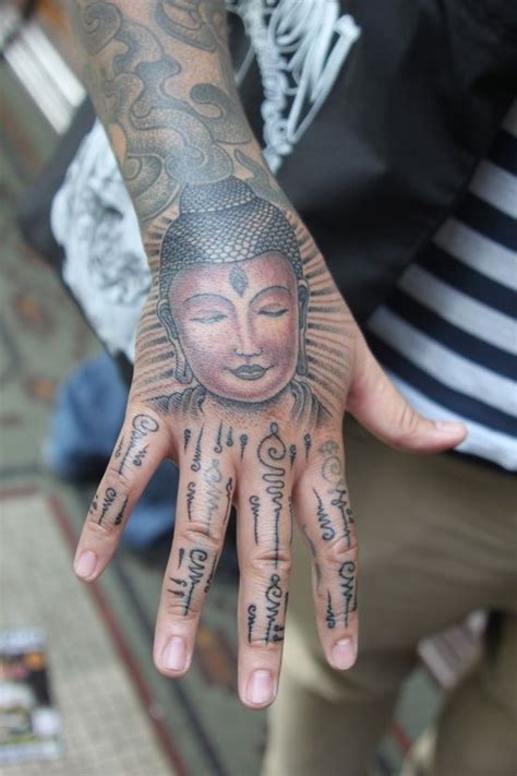 hand buddha tattoo|traditional buddhist tattoo.